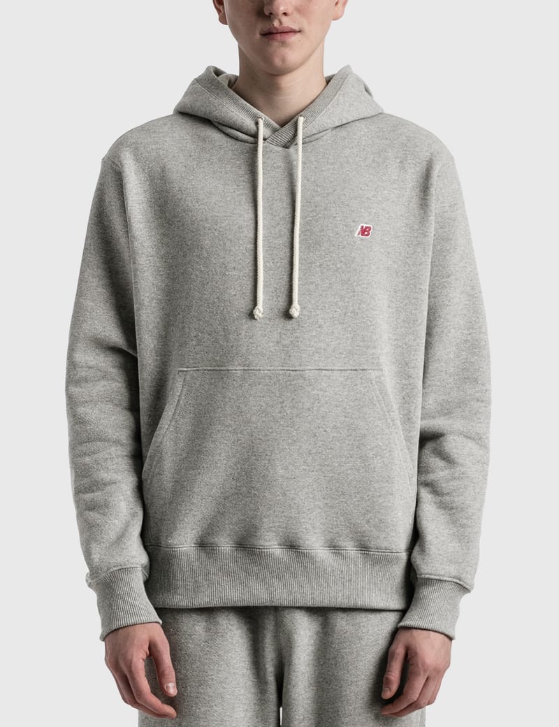 new balance core hoodie