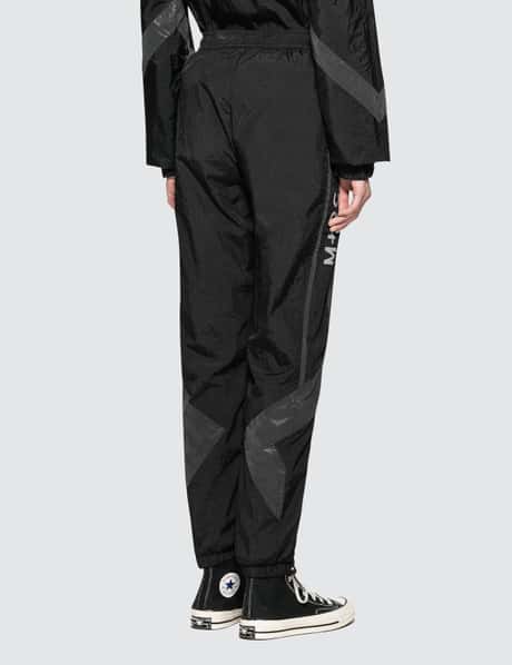 M+RC Noir - OG Reflective Track Pant | HBX - ハイプビースト 