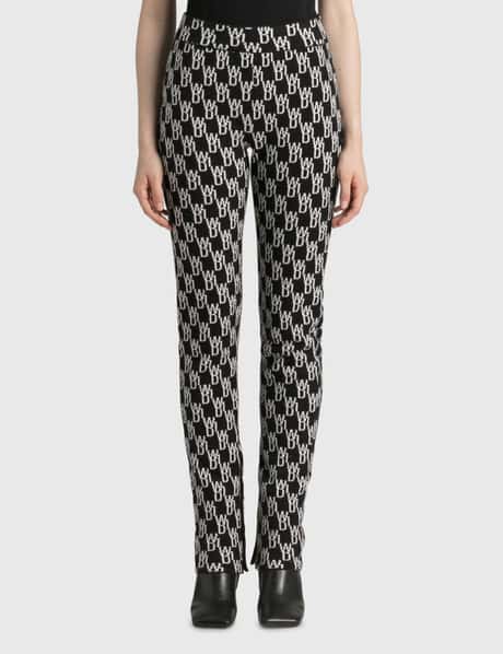 We11done - Side Slit Logo Jacquard Trousers | HBX - Globally  