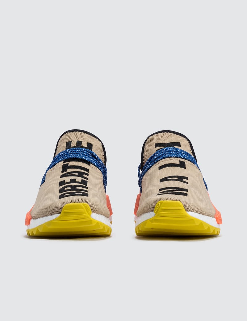 human race shoes blue and yellow