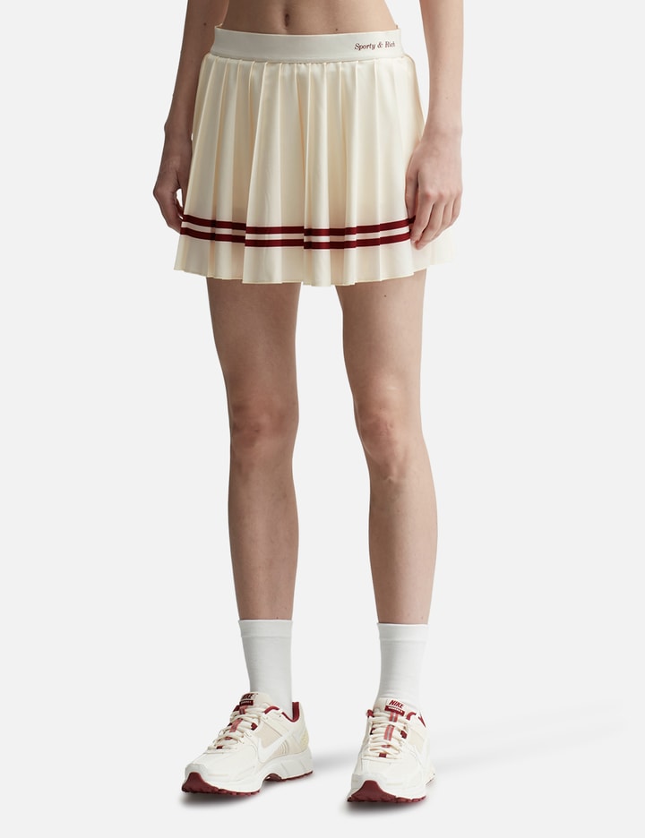 Shop Sporty &amp; Rich Classic Logo Pleated Skirt In White