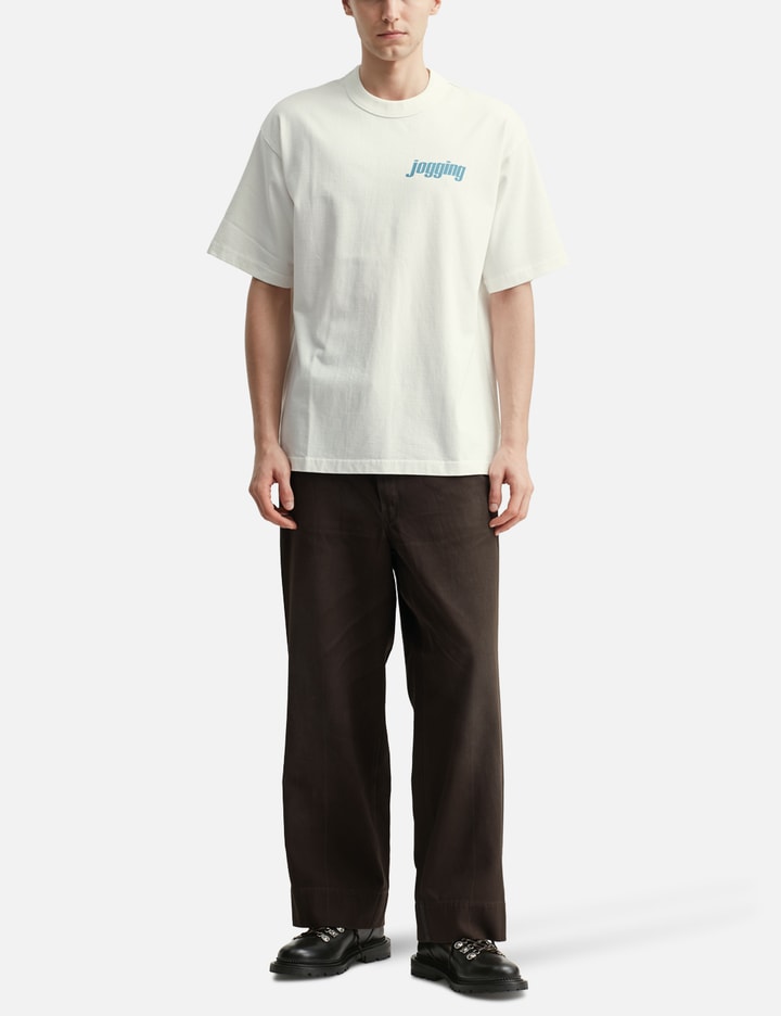 Unlikely Authentic Graphic Tee "Jogging" Placeholder Image