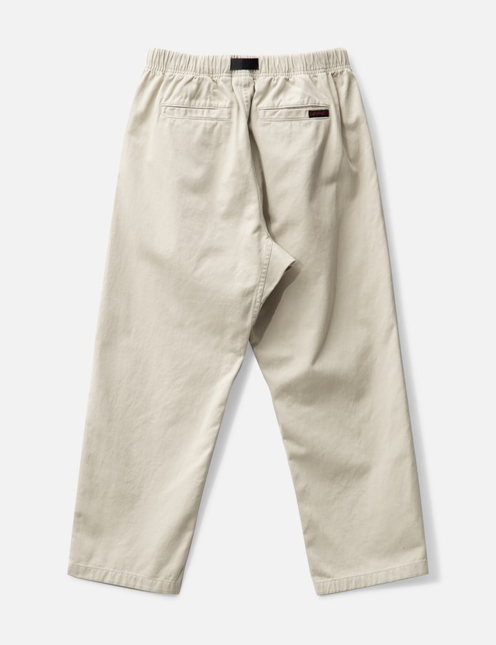 Shop Gramicci Loose Tapered Pants In Beige
