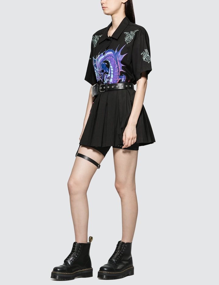 Pleated Skirt with Leather Garter Belt Placeholder Image