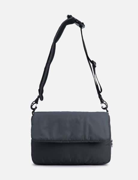 CLESSTE PADDED FLAP HOLIDAY BAG