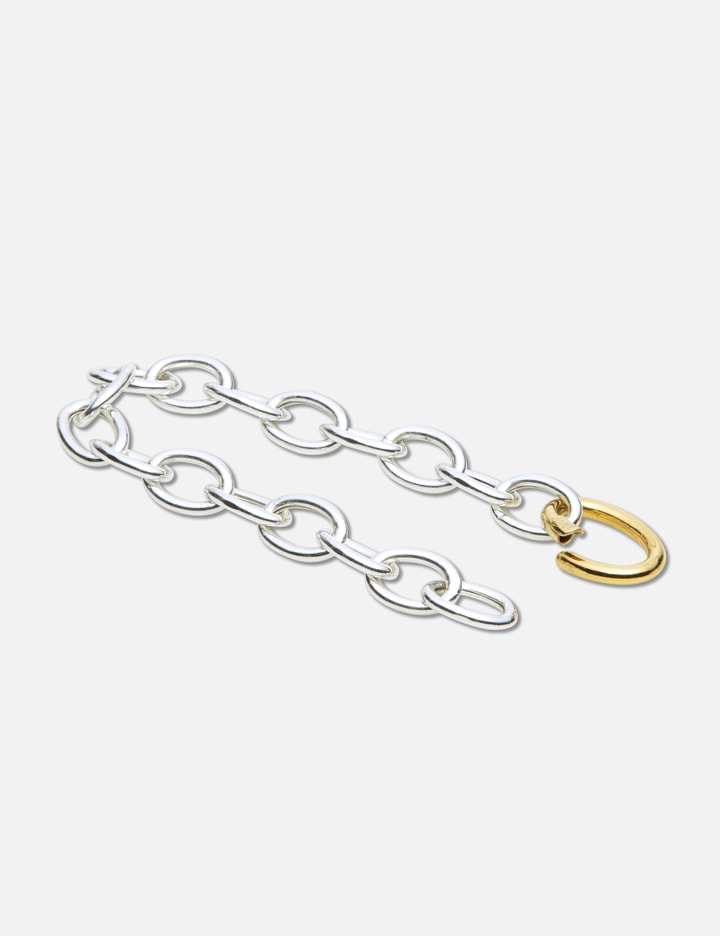 STERLING SILVER BRACELET WITH GOLD PLATED OVAL HOLD Placeholder Image