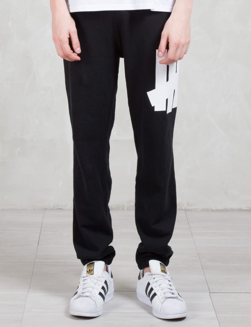 Undefeated - Big 5 Strikes Sweatpants | HBX - Globally Curated Fashion and  Lifestyle by Hypebeast