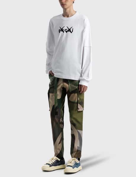 Sacai - KAWS Flock Print Long Sleeve T-shirt | HBX - Globally  