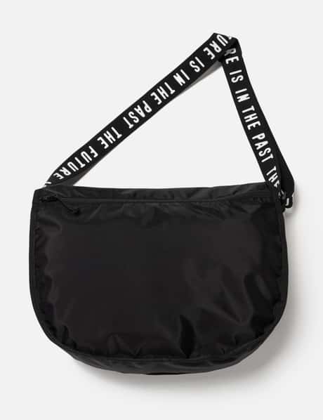 Human Made Shoulder Bag - Black nylon bag with logo strap and A4 