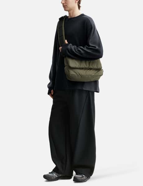 CLESSTE - PADDED FLAP HOLIDAY BAG | HBX - HYPEBEAST 為您搜羅全球 