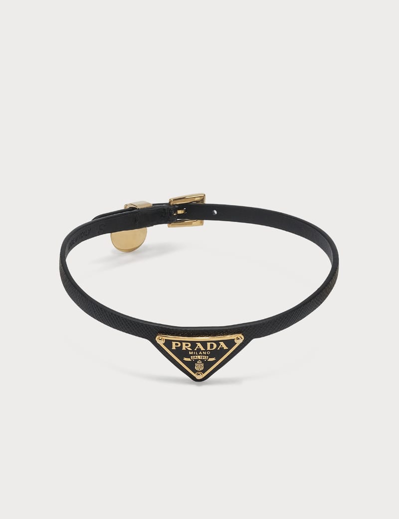 Prada Eternal Gold Eternal mini triangle pendant necklace in yellow gold  and diamonds | REVERSIBLE