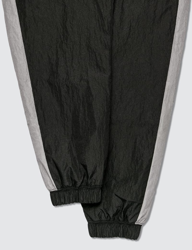 nike sportswear swoosh woven trousers