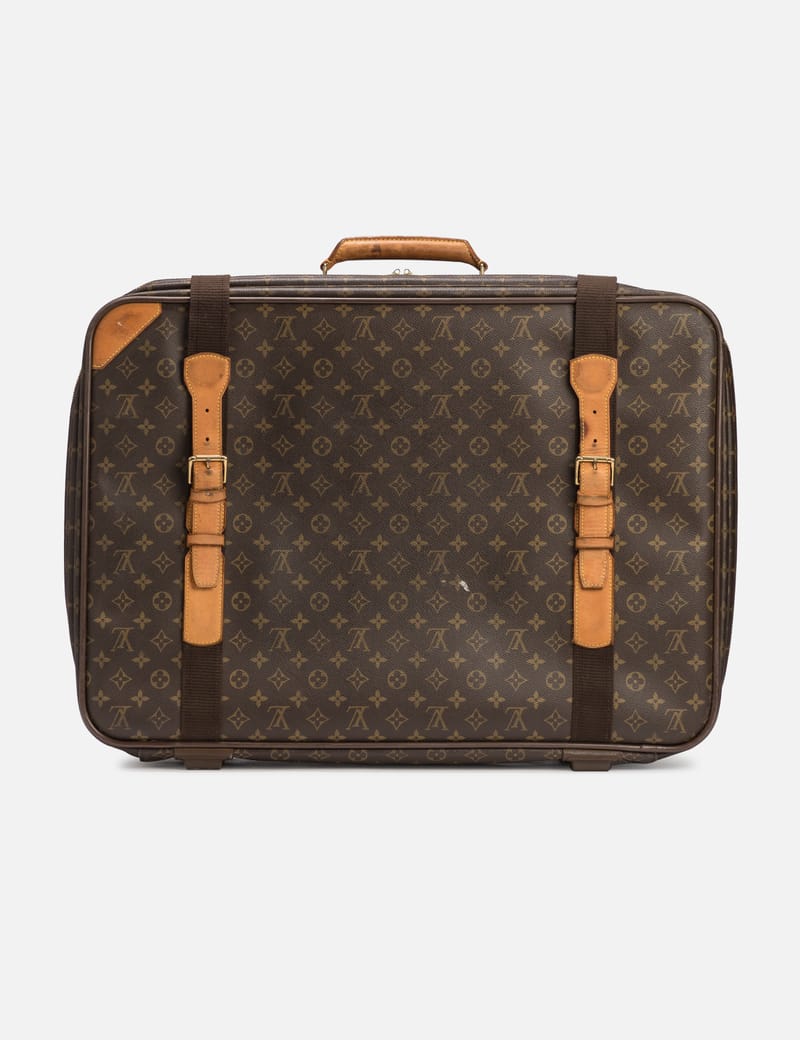 Garment leather travel bag Louis Vuitton Brown in Leather  31217318