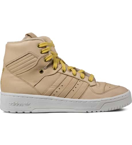 adidas Originals - Adidas Originals By NIGO St Pale Nude/St Pale Nude/White  Rivalry Hi Top Shoes | HBX