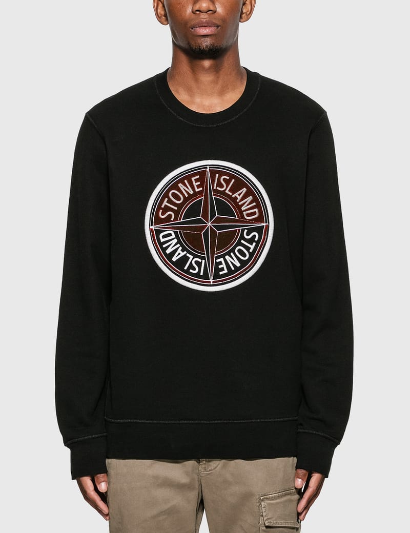 sweater with compass logo