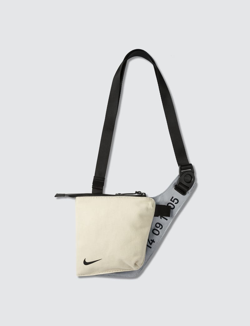 nike tech cross body