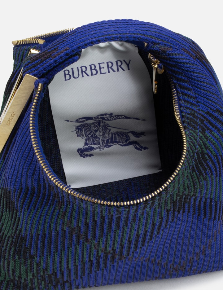 Shop Burberry Mini Peg Duffle Bag In Blue