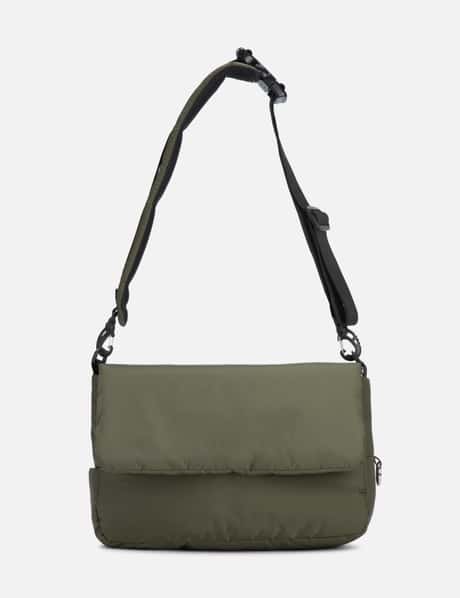 CLESSTE PADDED FLAP HOLIDAY BAG