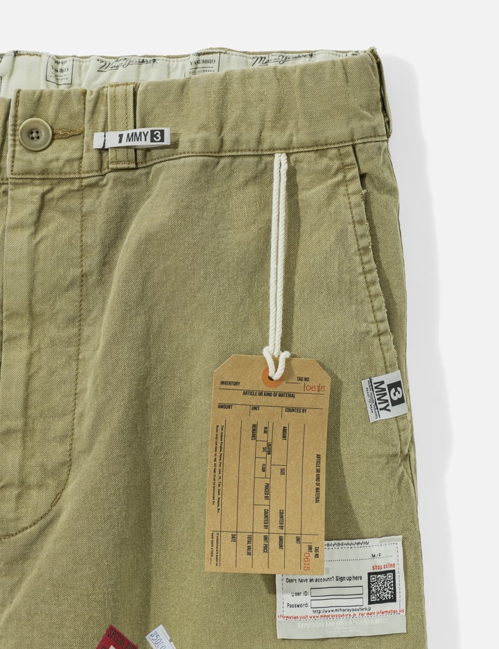 Maison Mihara Yasuhiro Price Tag Sticker Print Repaired Pants