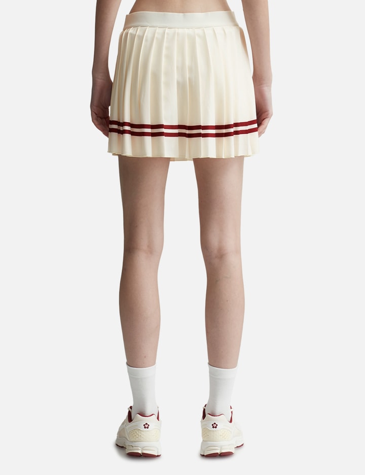 Shop Sporty &amp; Rich Classic Logo Pleated Skirt In White
