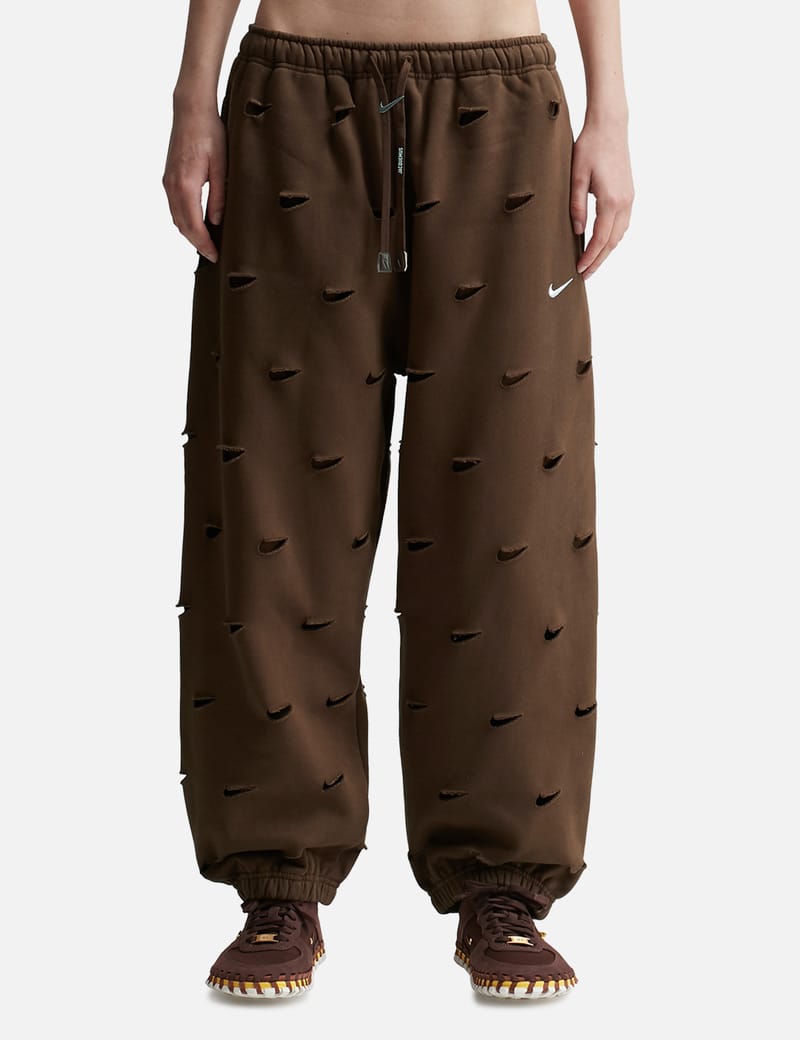 nike all over swoosh jogger