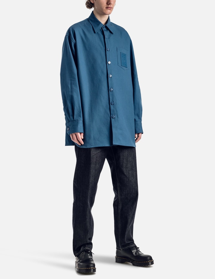 OVERSIZED DENIM SHIRT WITH R PIN IN BACK Placeholder Image