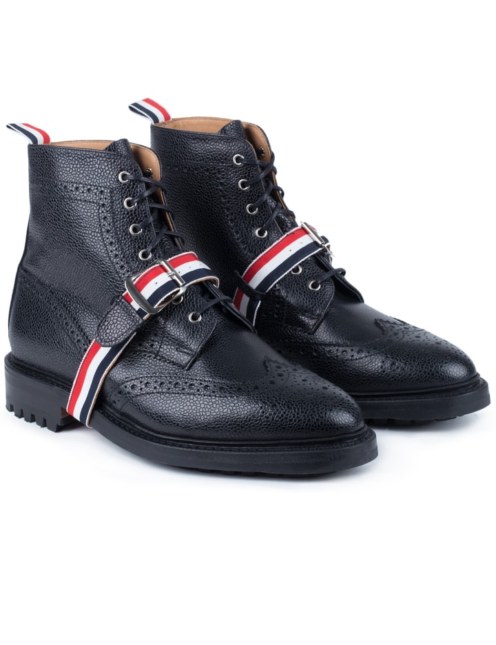 Pebble Grain Leather Classic Wingtip Boots with Commando Sole & Grosgrain Straps Placeholder Image