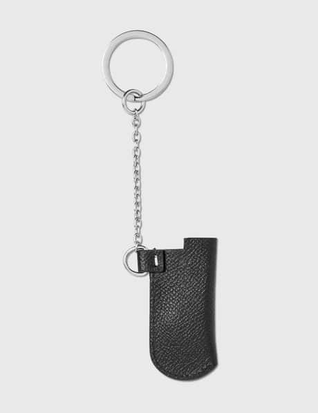 AMBUSH® - Logo Lighter Case Key Chain  HBX - Globally Curated Fashion and  Lifestyle by Hypebeast