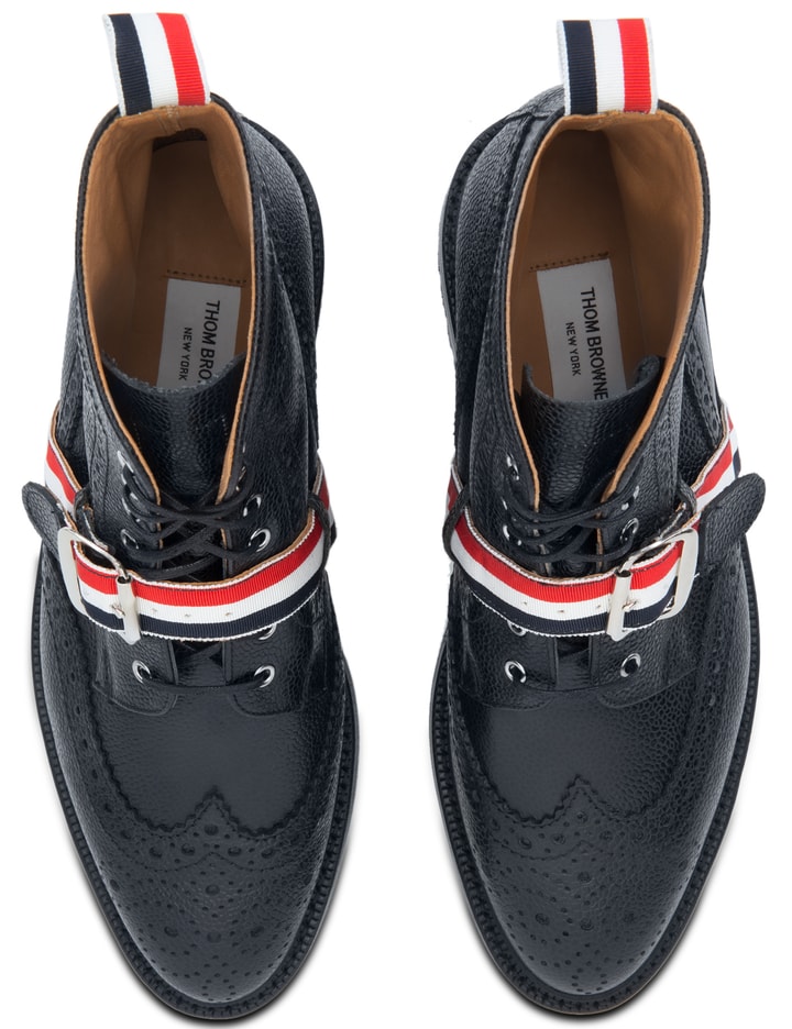 Pebble Grain Leather Classic Wingtip Boots with Commando Sole & Grosgrain Straps Placeholder Image