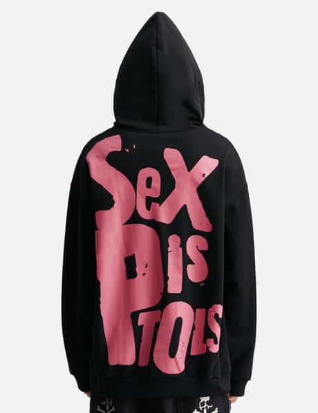 Mastermind World Mastermind World x Sex Pistols Logo Boxy Fit Hoodie - Black cotton punk logo hoodie | HBX Mastermind World Mastermind World x Sex Pistols Logo Boxy Fit Hoodie - Black cotton punk logo hoodie | HBX