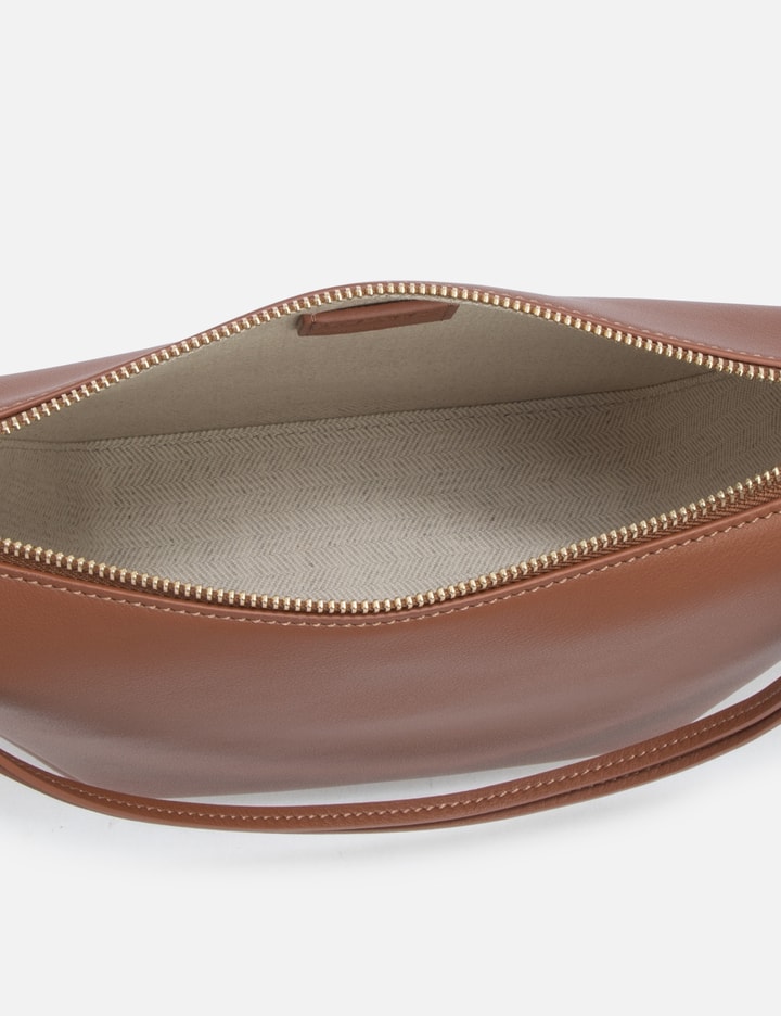 Loewe Hammock Drawstring Small Leather Shoulder Bag In Brown