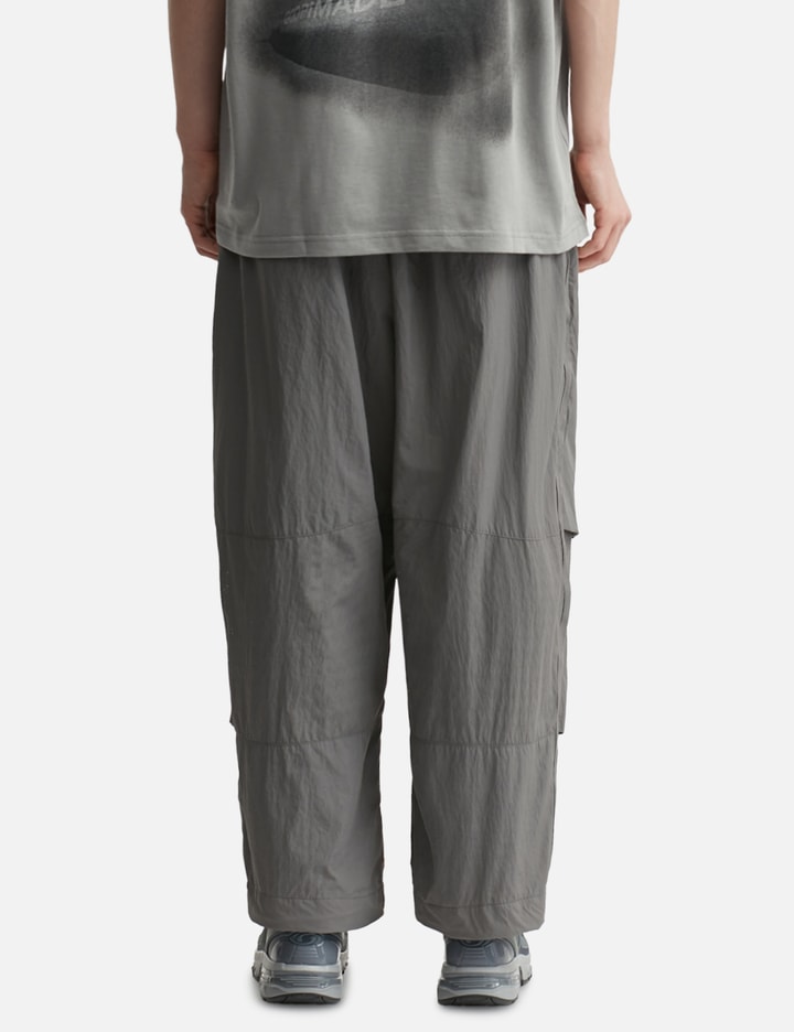 GOOPiMADE®  x Subcrew “RGW-01P” EDG(Y)BUG Grid System Track Pants Placeholder Image