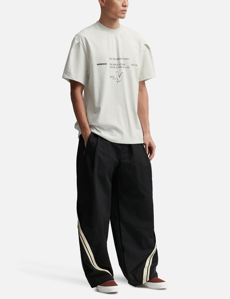 ellesse Trazzal oversized track pants in off white  ASOS