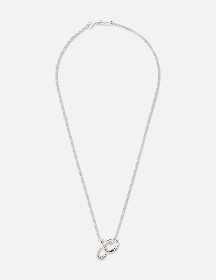 Small Mathematical Knot On A Chain