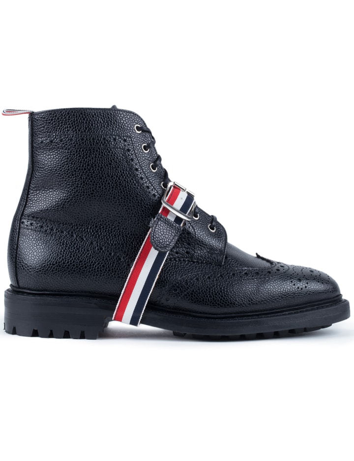 Pebble Grain Leather Classic Wingtip Boots with Commando Sole & Grosgrain Straps Placeholder Image