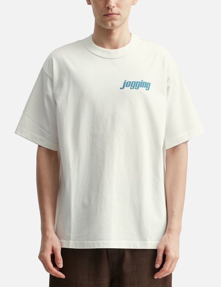 Unlikely Authentic Graphic Tee "jogging" In White