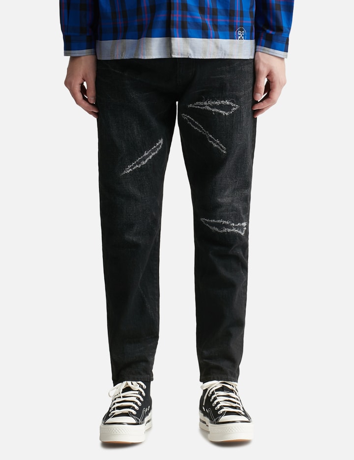 Shop Uniform Experiment Damaged Denim Tapered Pants In Black