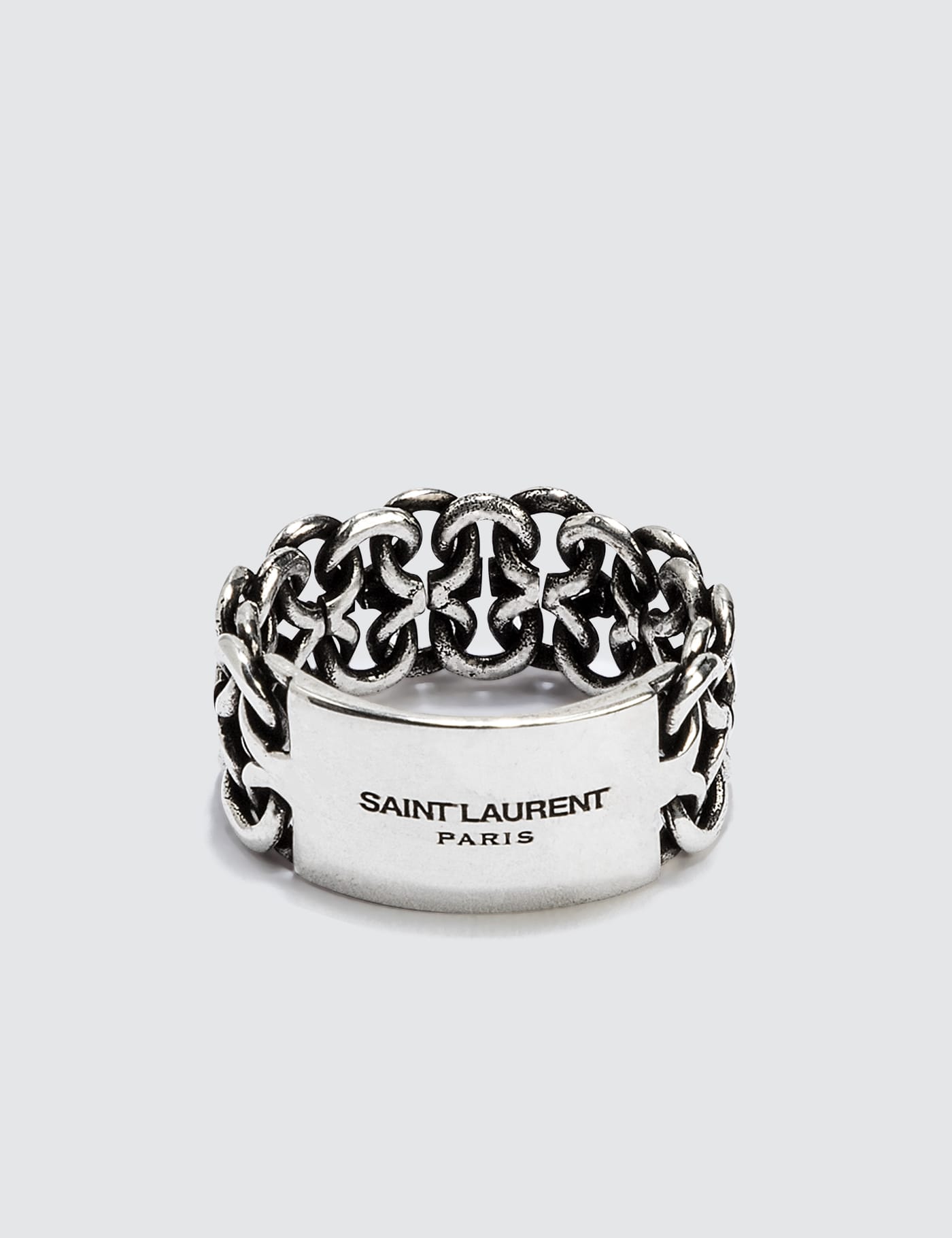 YVES SAINT LAURENT. Gold-plated metal ring adorned with … | Drouot.com