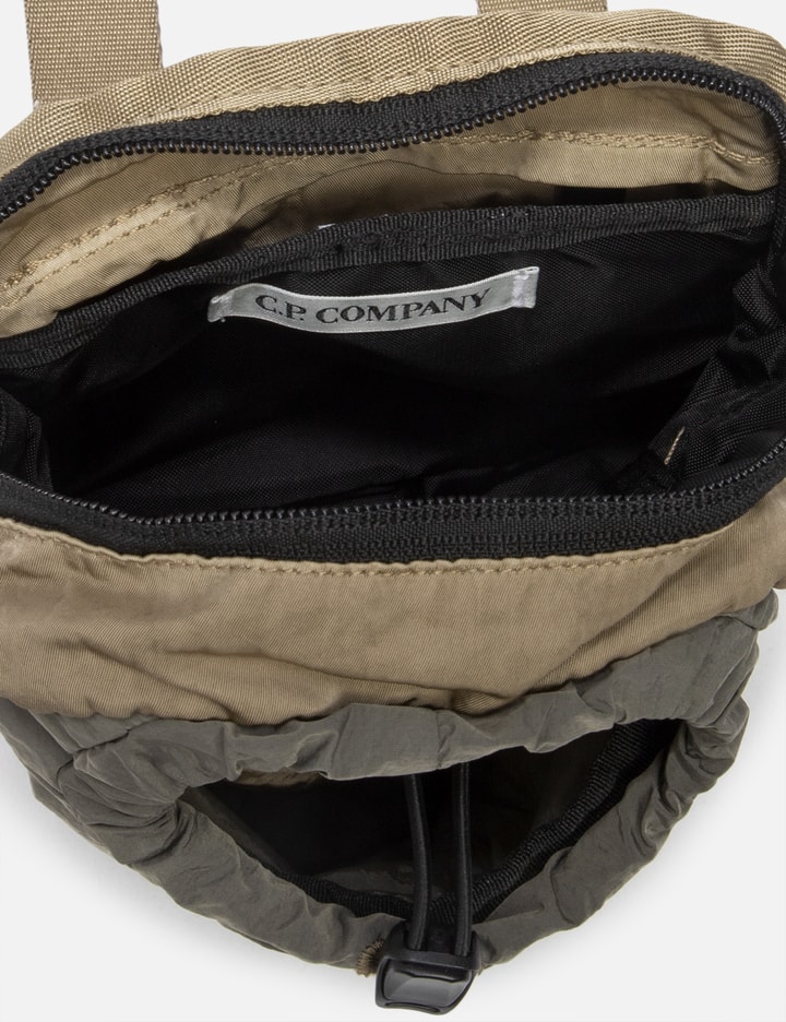 C.P. Company - Nylon B Crossbody Rucksack  HBX - Globally Curated Fashion  and Lifestyle by Hypebeast