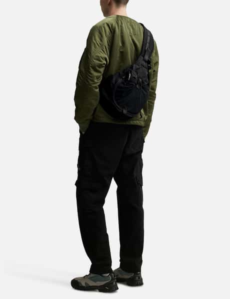 C.P. Company - Nylon B Crossbody Mesh Rucksack | HBX - ハイプ 