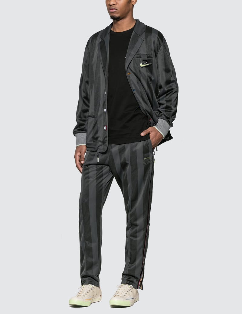 nike team rivalry tearaway pants