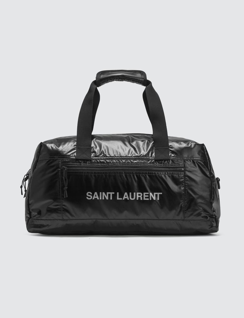 nuxx duffle bag in nylon with a saint laurent print