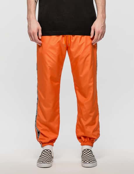LMC - Pleasures X LMC Tape Logo Track Pants | HBX