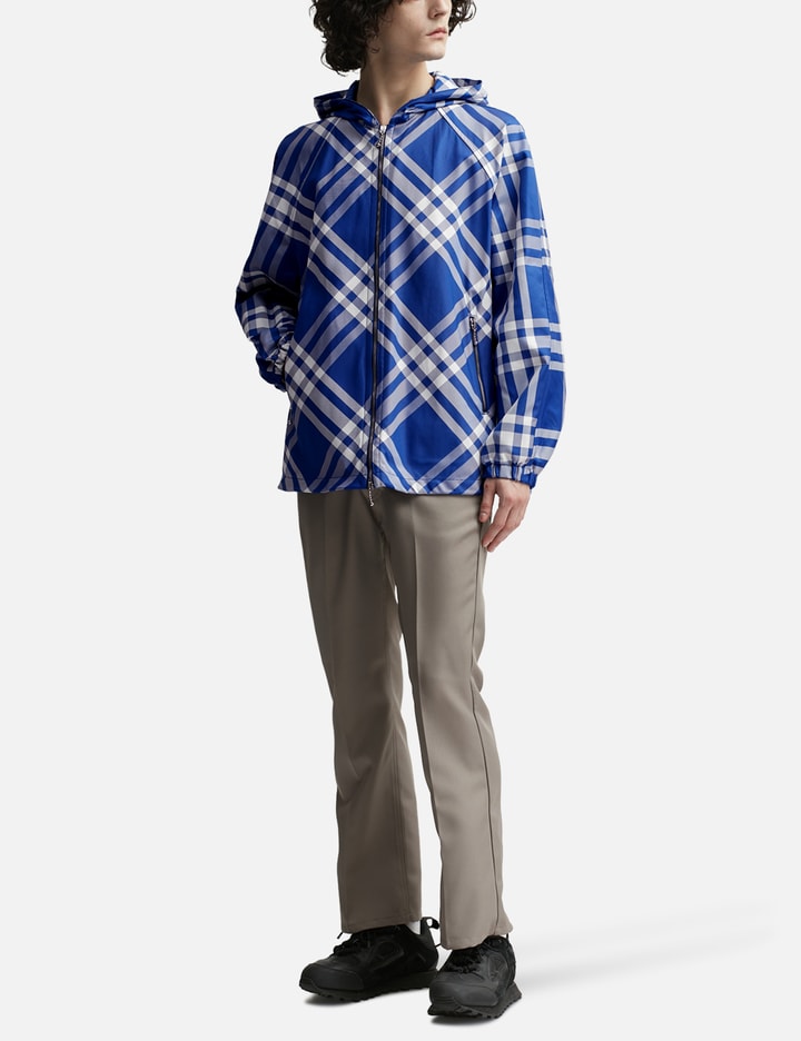 Shop Burberry Check Nylon Hooded Jacket In Blue