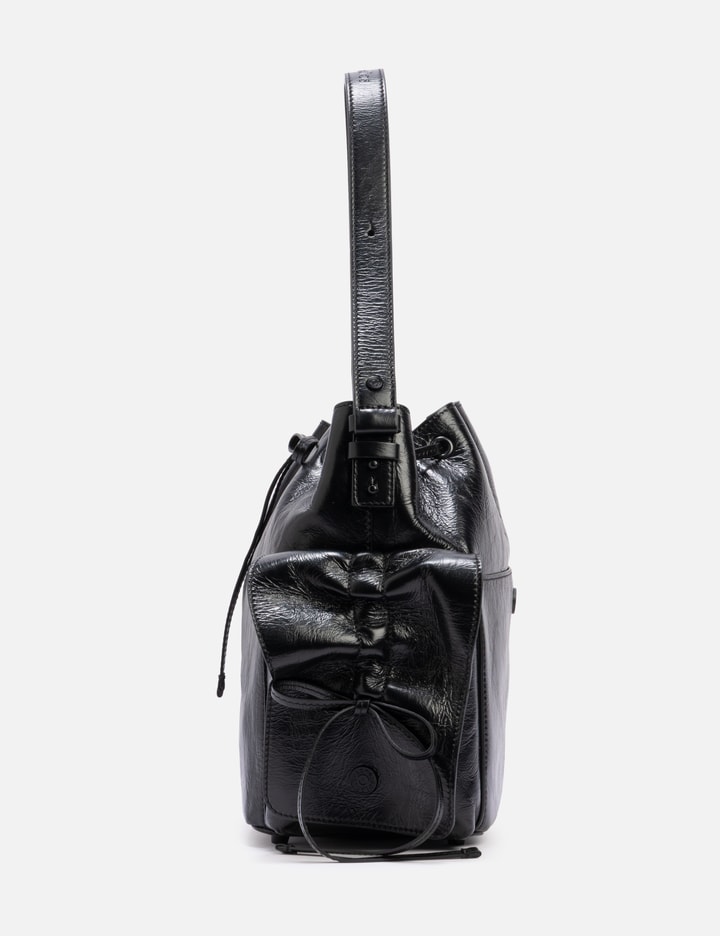 Acne Studios Multipocket Mini Crinkled Leather Bucket Bag In Animal Print