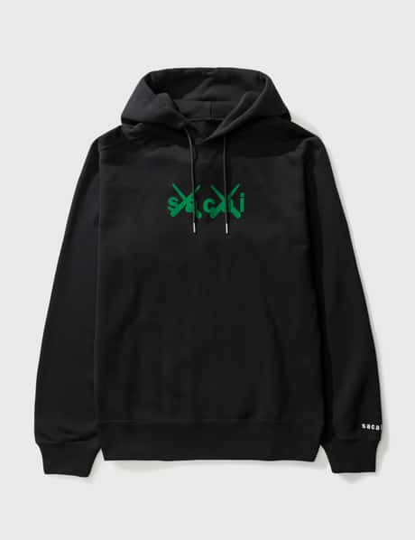 Sacai - KAWS Flock Print Hoodie | HBX