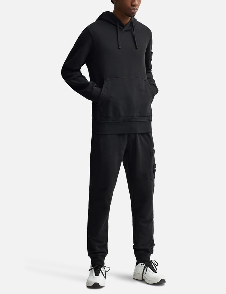 Shop Stone Island Garment-dyed Cotton Hoodie In Black