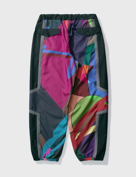 Sacai - KAWS Print Pants | HBX