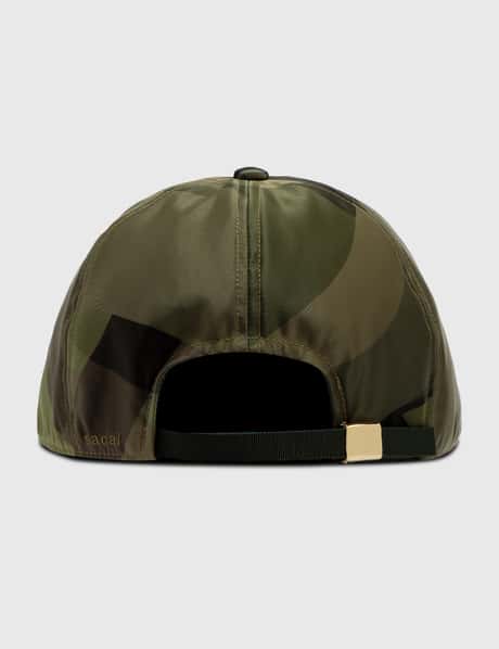 Sacai - KAWS S Cap | HBX - Globally Curated Fashion and Lifestyle 