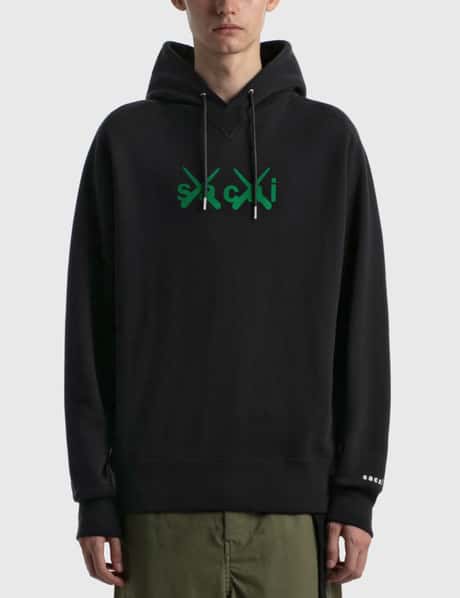 Sacai - KAWS Flock Print Hoodie | HBX - Globally Curated Fashion  